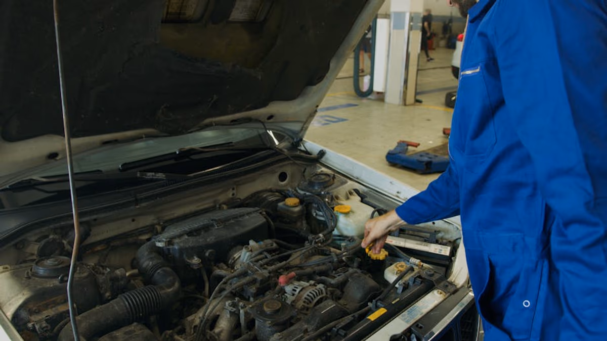 Small petrol engine with visible damage from neglect