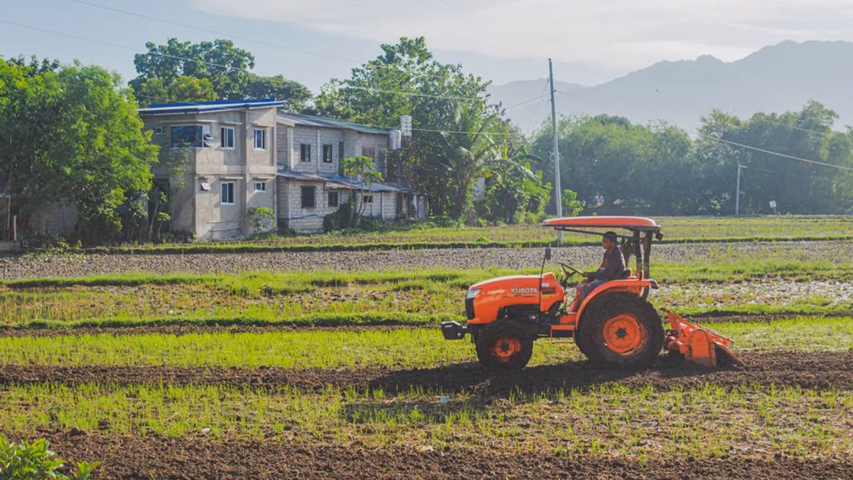 Kubota compact tractor on farmland — hydrostatic and PTO repairs