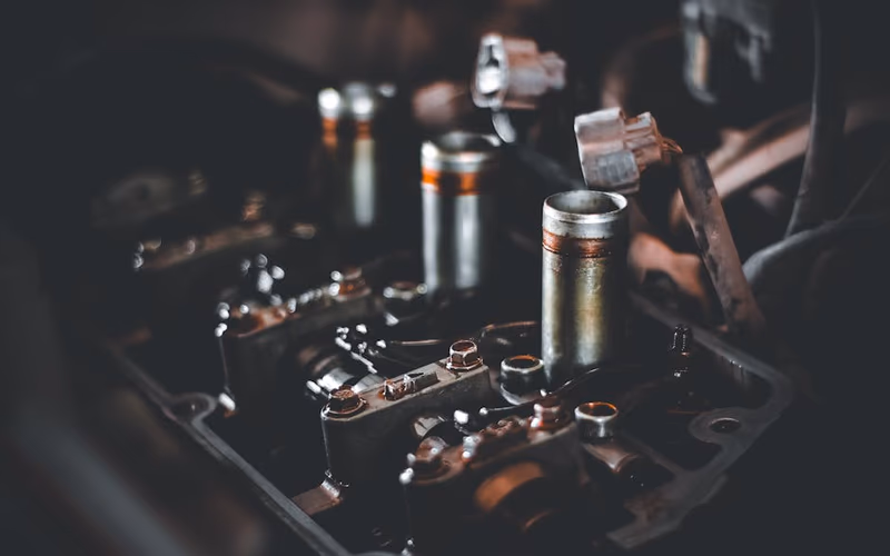Spark plug inspection during a petrol lawnmower service