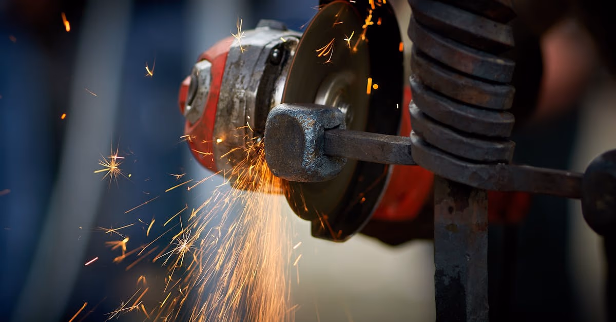 Close-up of a grinder shaping metal with bright sparks flying
